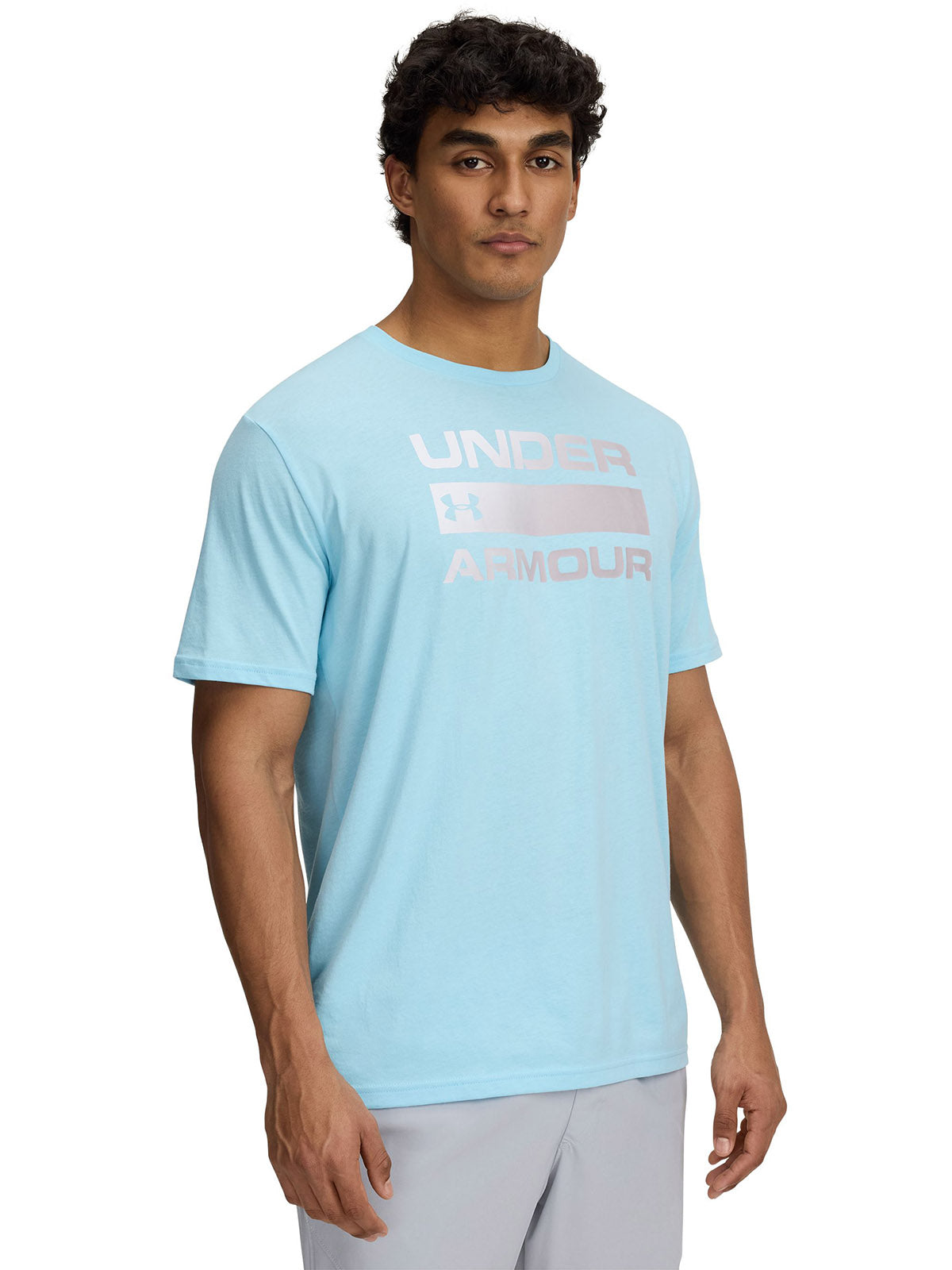 Polera manga corta Under Armour team issue wordmark azul para hombre