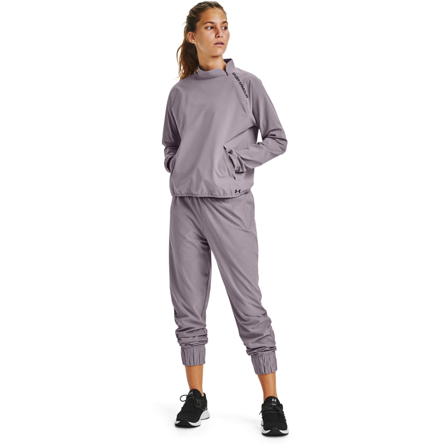 Polerón UA Woven ¼ Zip para Mujer