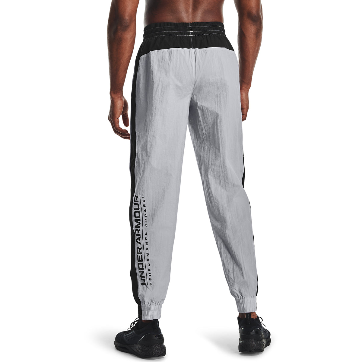 Jogger UA Woven Track para Hombre