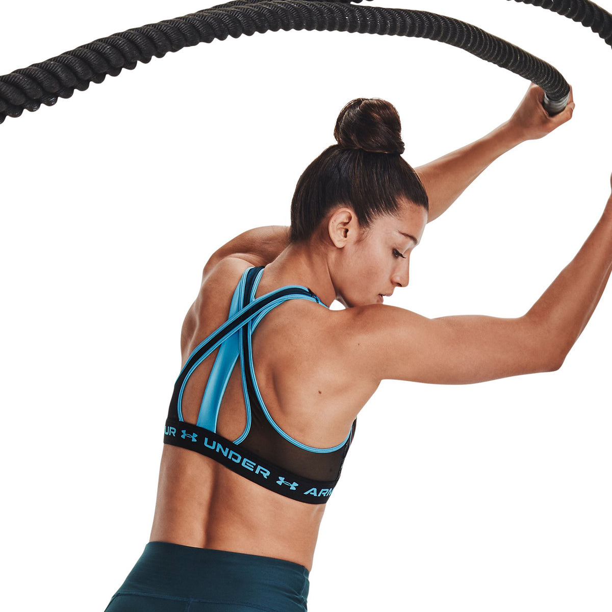 Sostén deportivo de impacto medio Armour® Crossback para mujer