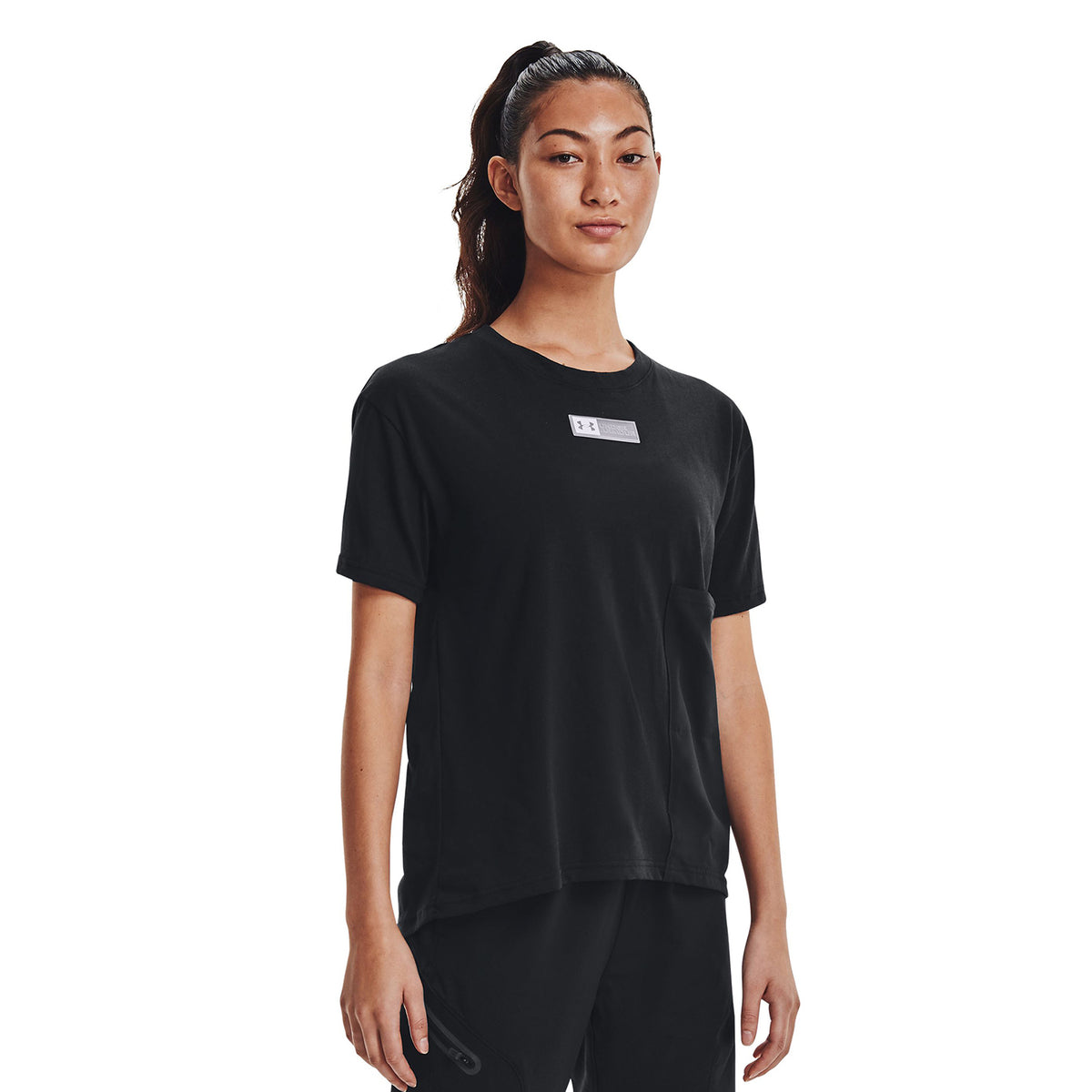 Polera con bolsillo UA Armour para mujer