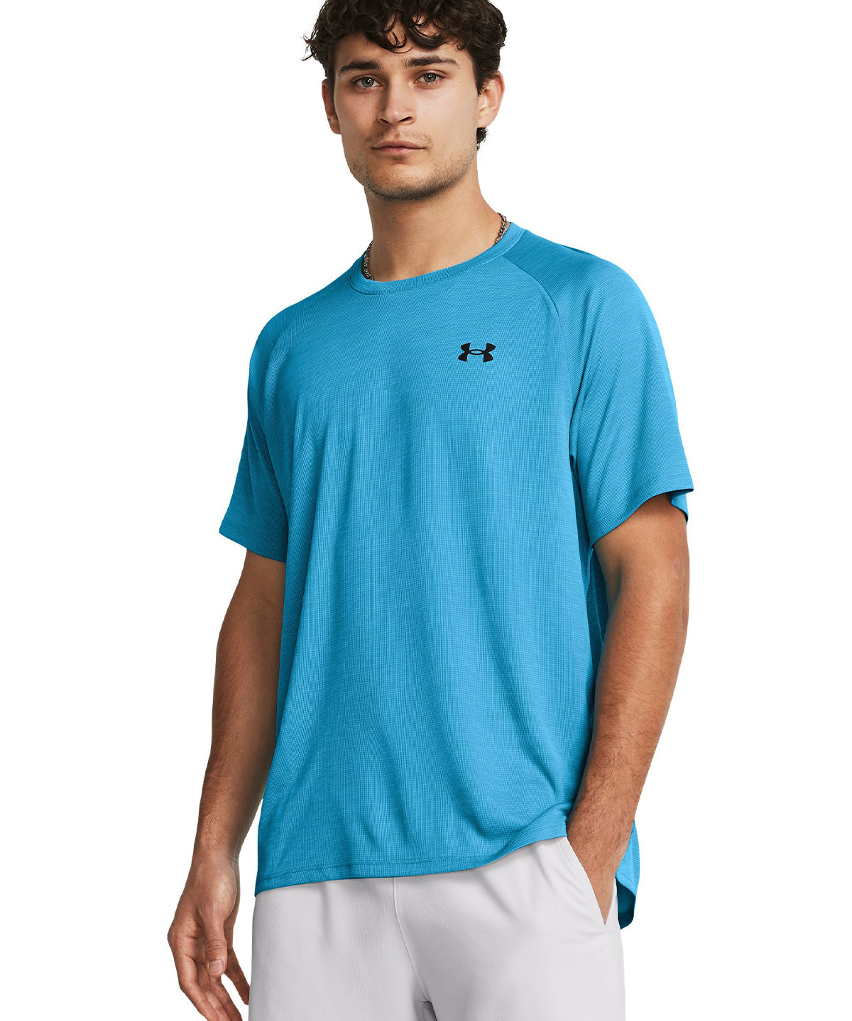 Polera manga corta texturizada UA Tech¿ para hombre