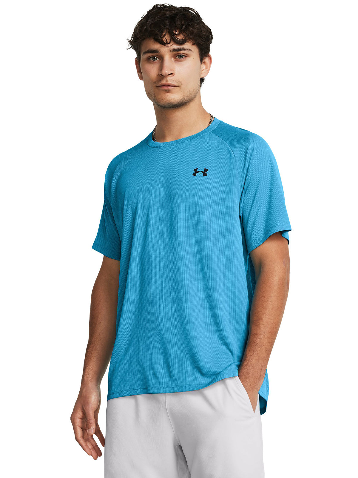 Polera manga corta texturizada UA Tech¿ para hombre
