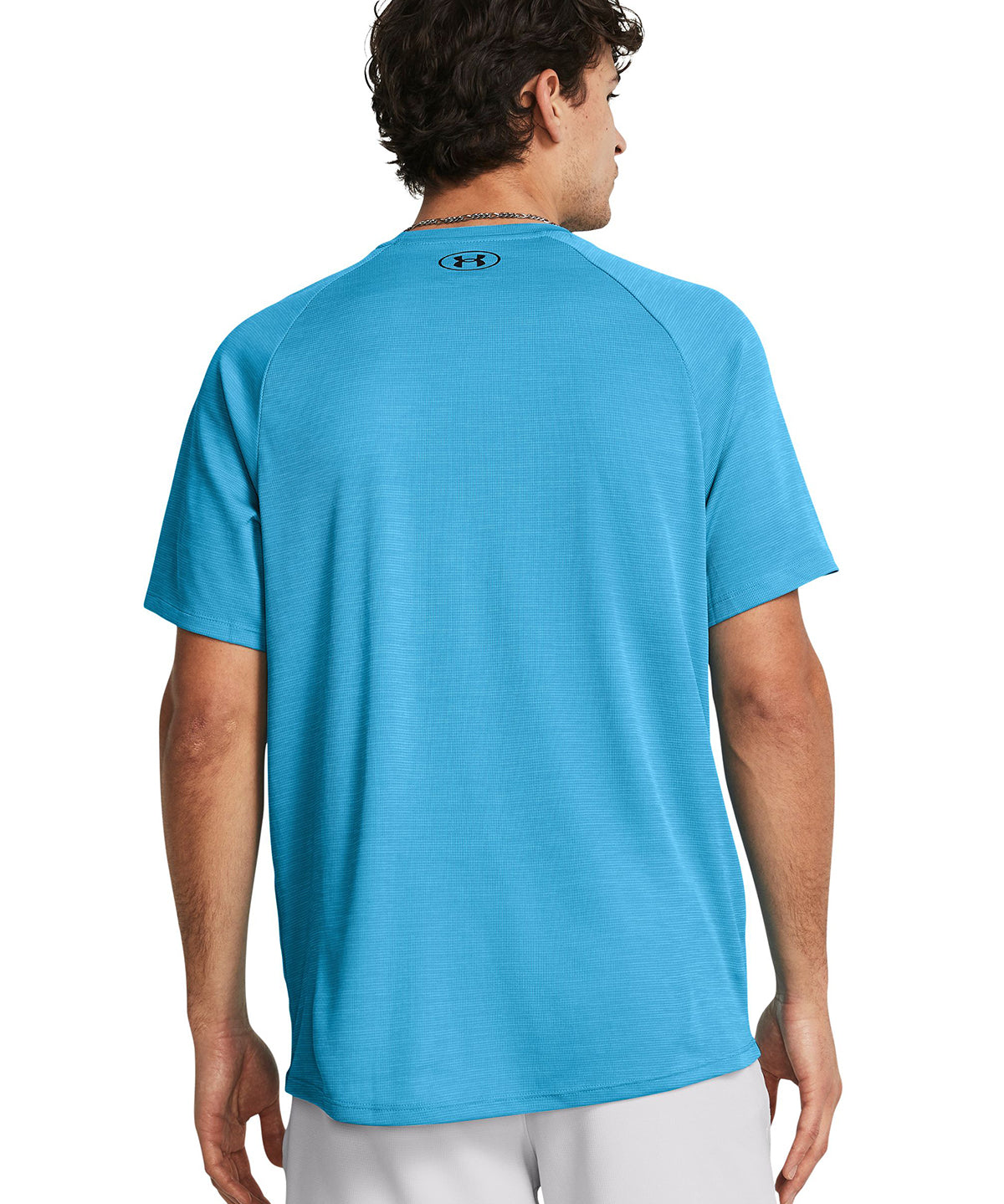 Polera manga corta texturizada UA Tech¿ para hombre