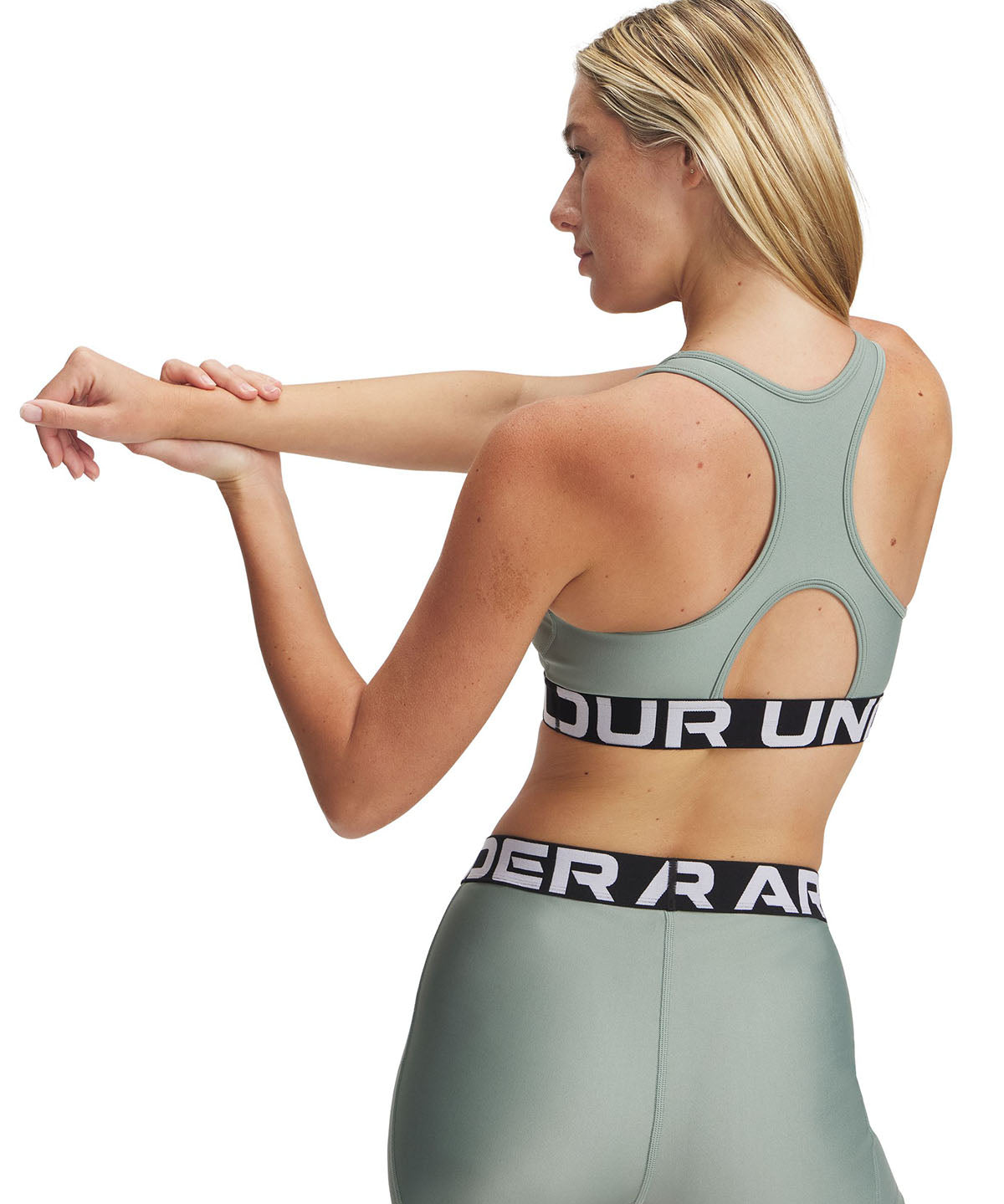 Sostén deportivo Heatgear armour mid verde para mujer Under Armour