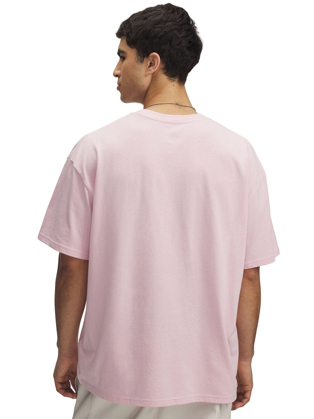 Polera manga corta Under Armour oversized rosado para hombre